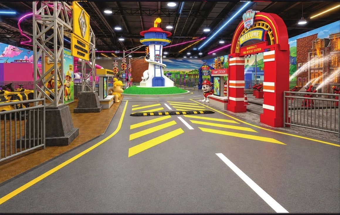 Indoor family ride-on zone in a mall