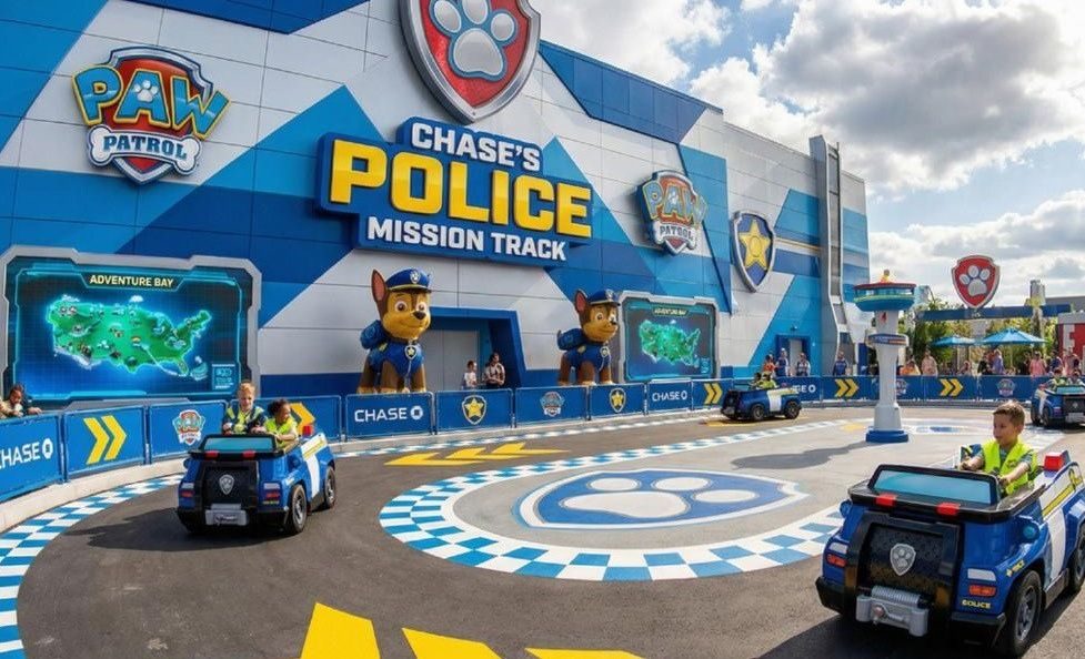Children driving vehicles on a themed track